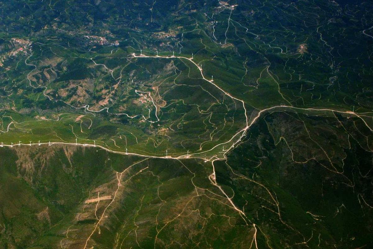 The old bridge spanned the wide river